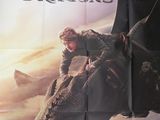 affiche du film « Comment dresser son dragon », sur laquelle on voit un homme chevauchant un dragon