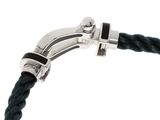 a close up of a black rope bracelet with a silver clasp