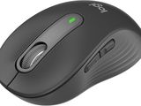 a close up of a computer mouse on a white surface