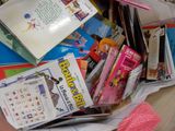 a pile of children ' s books on a table