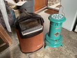 a green stove and a blue stove on the floor