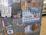 a large metal cart with a lot of items in it