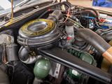 a close up of a car ' s engine with its hood open