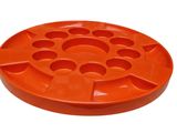 a close up of an orange plastic dog bowl on a white background