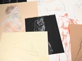 many different types of drawings on the table