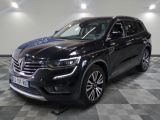 a black volkswagen suv is parked in a large room