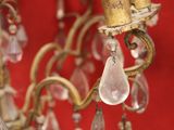 a chandelier that has a bunch of crystals hanging from it