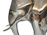 a silver elephant statue on a white background
