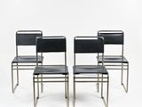 lot de quatre chaises de salle à manger en cuir noir et chromé