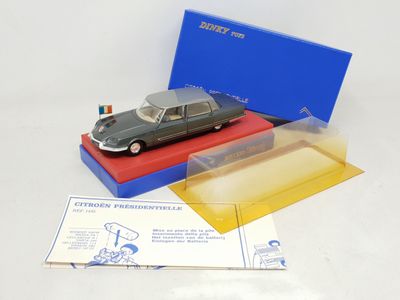 a small toy car sitting on top of a box