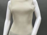 an image of a mannequin wearing a white top and black pants