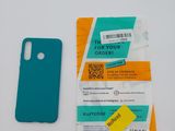 a phone that is sitting on a table next to a card