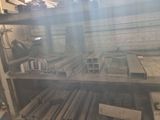 a room filled with lots of metal pipes and pipes