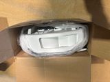 a cardboard box with a microwave in it that is in the middle of it
