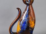 an image of a cat figurine made of glass