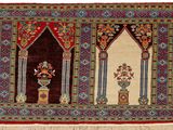 an image of a rug with a design of arches and columns