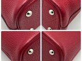 four different pictures of a red purse with eyes on it