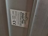a picture of a metal door with a sticker on it
