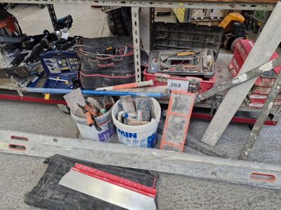 a lot of tools that are sitting on the floor