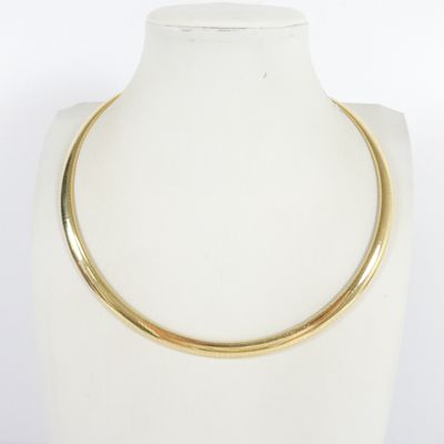 a close up of a necklace on a mannequin mannequin