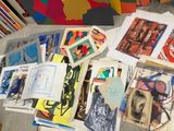 a table that has a lot of art on it