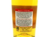the back of a bottle of liquor with a label on it