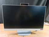 an image of a computer monitor sitting on top of a wooden table