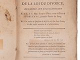 an old book with writing on it sitting on a table