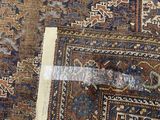 an image of a rug with a piece of tape on top of it