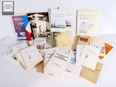 a lot of books that are sitting on a table