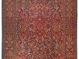 tapis persan ancien à motif floral sur fond rouge
