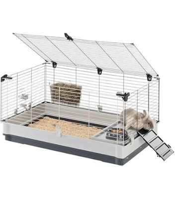 a small cage with a hamster inside of it