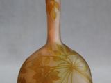 two vases sitting next to each other on a table