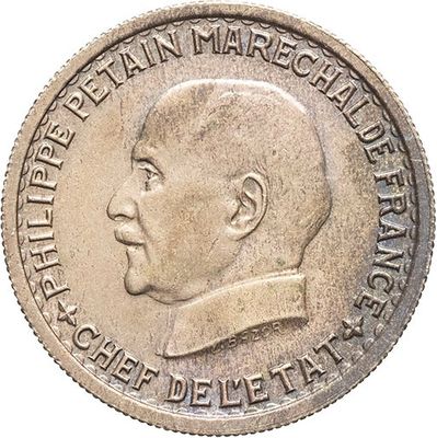 une vieille pièce de monnaie sur laquelle figure l'image d'un homme