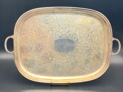 a silver tray with a handle and handles on it