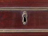 a close up of a wooden chest with a keyhole on it