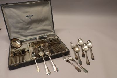 a case with silverware in it on a table