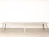 an image of a white table in a room with a white wall