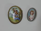 two miniature pictures of a woman and a child are displayed on a wall