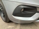 a close up of the front bumper of a car