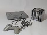 a video game system and a game controller next to each other