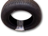 a close up of a tire on a white background