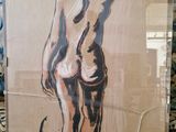 une photo d'un tableau représentant une femme nue, exposé