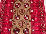 an oriental rug with red and beige colors on a white background
