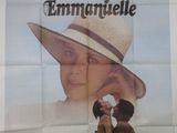 une vieille affiche de cinéma représentant une femme et un homme portant chacun un chapeau