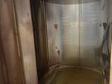 an image of a dirty bathroom with a toilet and shower