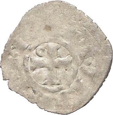 a close up of a coin with a cross on it