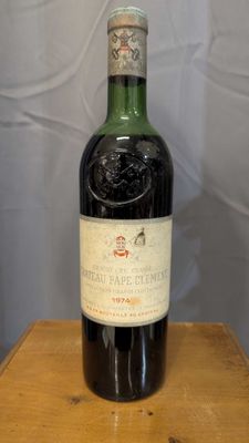 a bottle of wine that is sitting on a table