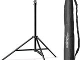 a close up of a tripod with a bag on a white background