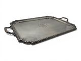 an antique silver tray with handles and handles on a white background